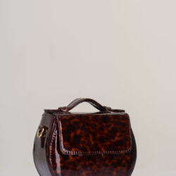 Amber Mini Box Bag by O’Eclat in brown patent leather