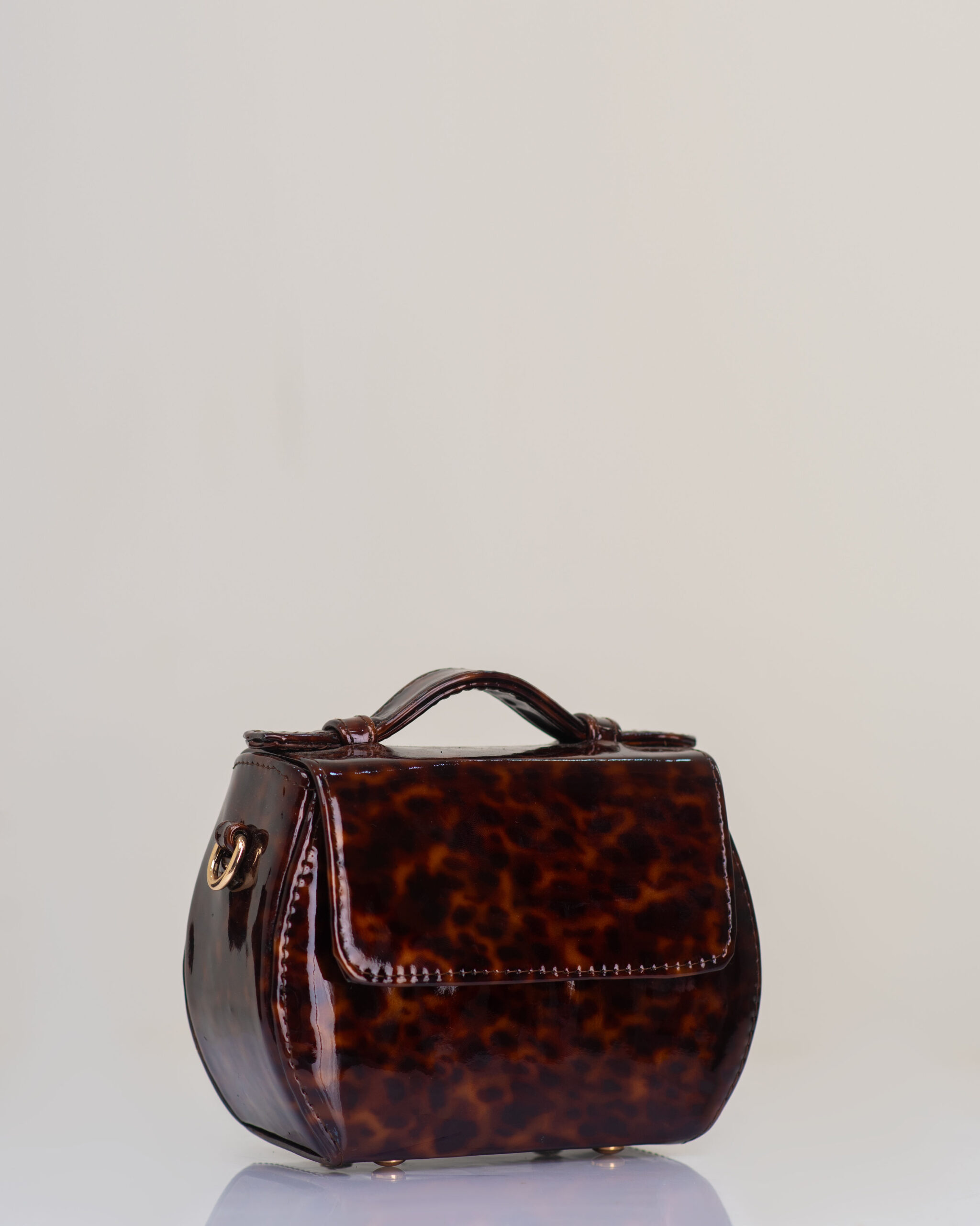 Amber Mini Box Bag by O’Eclat in brown patent leather Amber Mini Box Bag by O’Eclat in brown patent leather